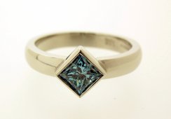 Platinum "treated-blue" Diamond ring